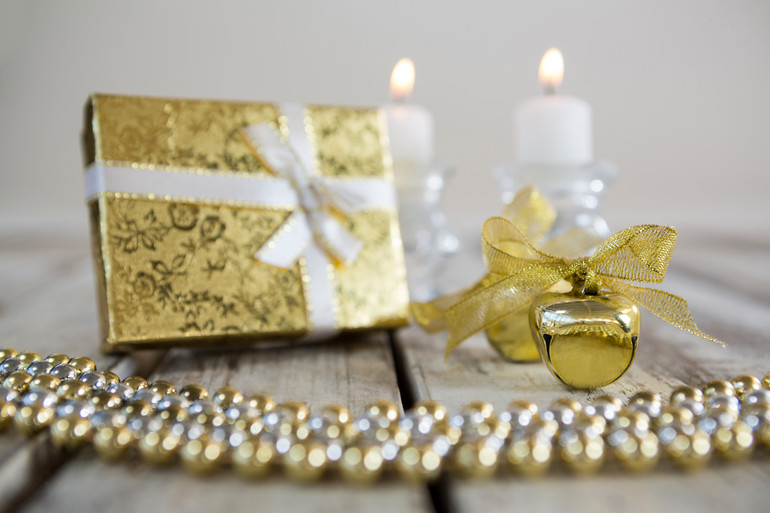 Christmas decoration and ornaments on wooden plank